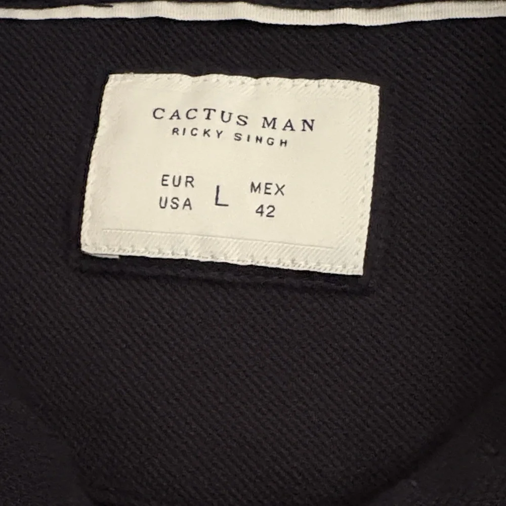 Cactus Man Ricky Singh Navy Polo - Picture 2 of 15